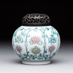 A Chinese doucai 'bajixiang' vase with a reticulated wooden cover, Yongzheng mark, 19/20th C. — photo 1