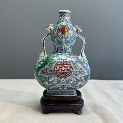 A Chinese doucai double-gourd vase with dragons and ruyi handles — photo 1