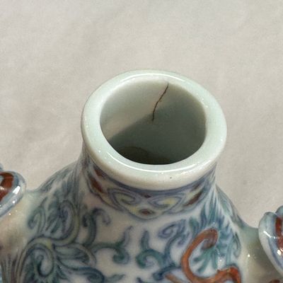A Chinese doucai double-gourd vase with dragons and ruyi handles — photo 16