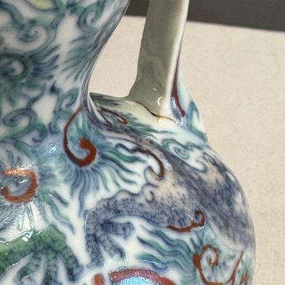 A Chinese doucai double-gourd vase with dragons and ruyi handles — photo 6