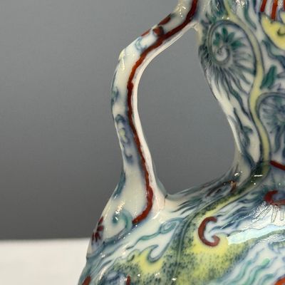 A Chinese doucai double-gourd vase with dragons and ruyi handles — photo 10