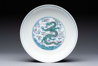 A Chinese doucai 'dragon' plate, Yongzheng mark and of the period