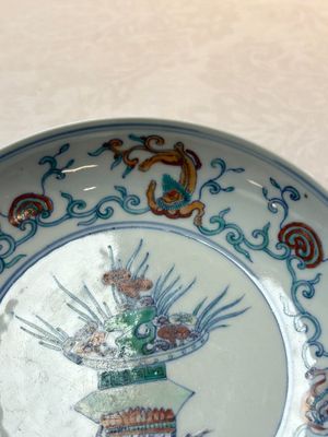 A Chinese doucai 'flower basket' plate, Chenghua mark, 18/19th C. — photo 3