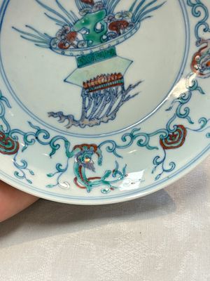 A Chinese doucai 'flower basket' plate, Chenghua mark, 18/19th C. — photo 4