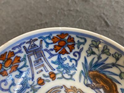 A Chinese doucai 'phoenix' saucer, Jiaqing mark, 19th C. — photo 7