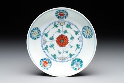 A Chinese doucai plate with stylised floral design, Chenghua mark, Kangxi/Yongzheng
