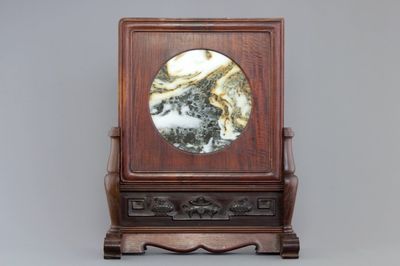 A Chinese dream stone plaque in a carved hardwood stand, 19/20th C.
