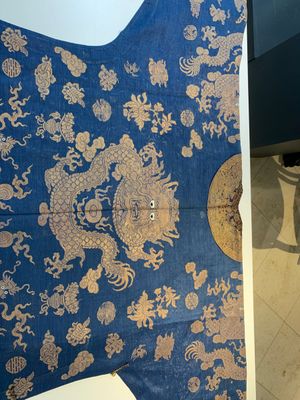 A Chinese embroidered silk blue-ground summer gauze 'nine dragons' robe, 19th C. — photo 11