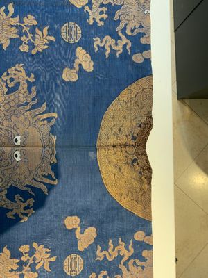A Chinese embroidered silk blue-ground summer gauze 'nine dragons' robe, 19th C. — photo 13