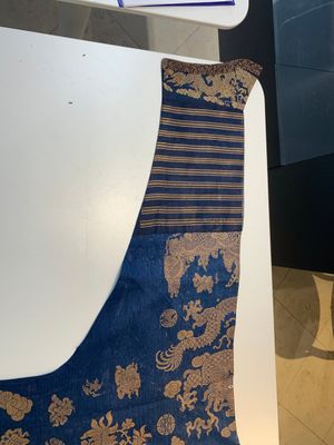 A Chinese embroidered silk blue-ground summer gauze 'nine dragons' robe, 19th C. — photo 14