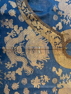 A Chinese embroidered silk blue-ground summer gauze 'nine dragons' robe, 19th C. — photo 2