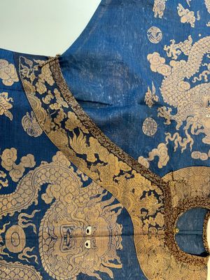 A Chinese embroidered silk blue-ground summer gauze 'nine dragons' robe, 19th C. — photo 4