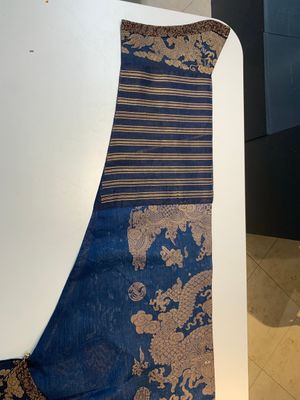 A Chinese embroidered silk blue-ground summer gauze 'nine dragons' robe, 19th C. — photo 5