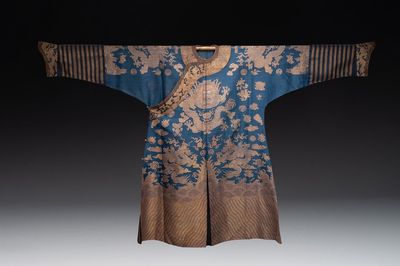 A Chinese embroidered silk blue-ground summer gauze 'nine dragons' robe, 19th C.