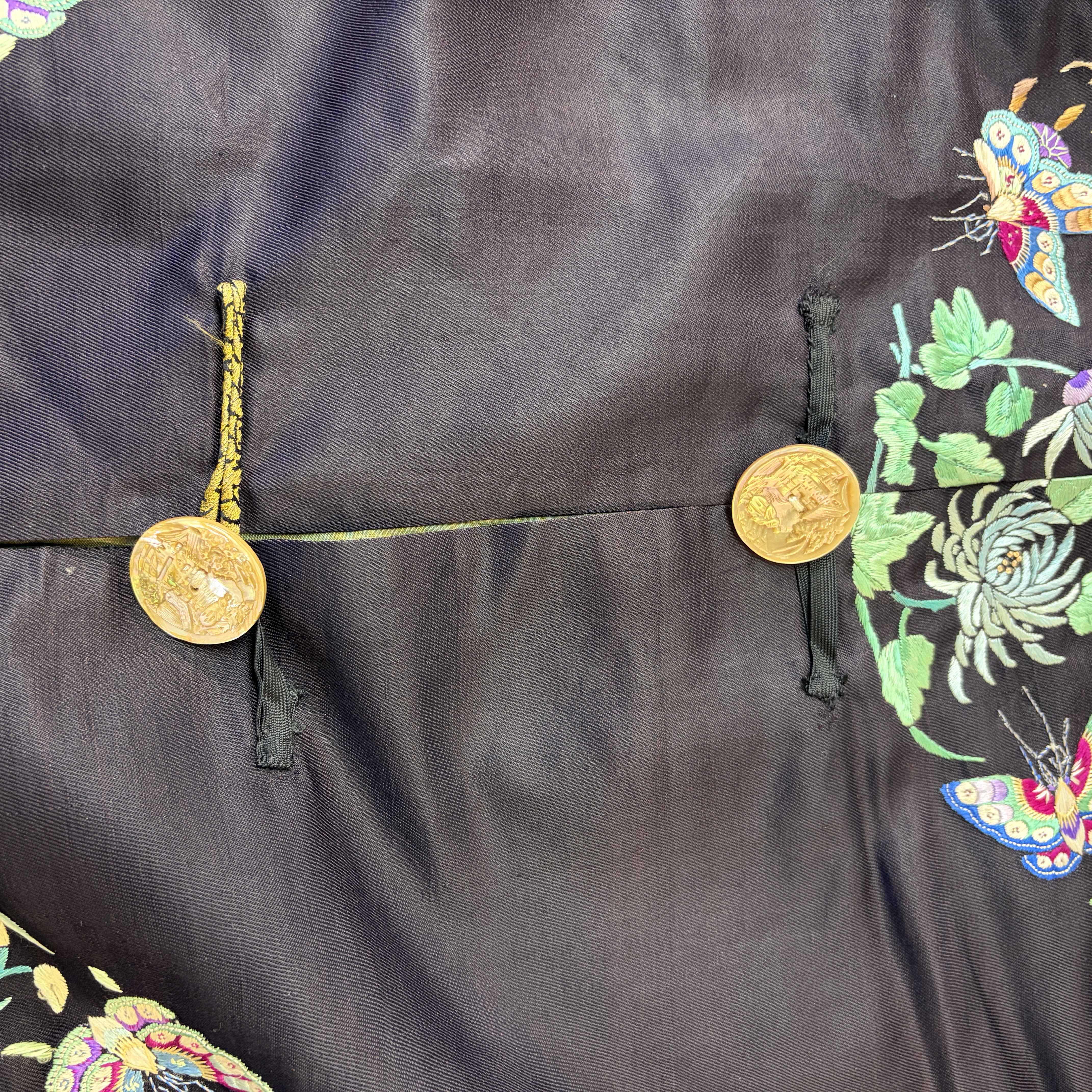 A Chinese embroidered silk dark-blue-ground robe with floral medallions — photo 20