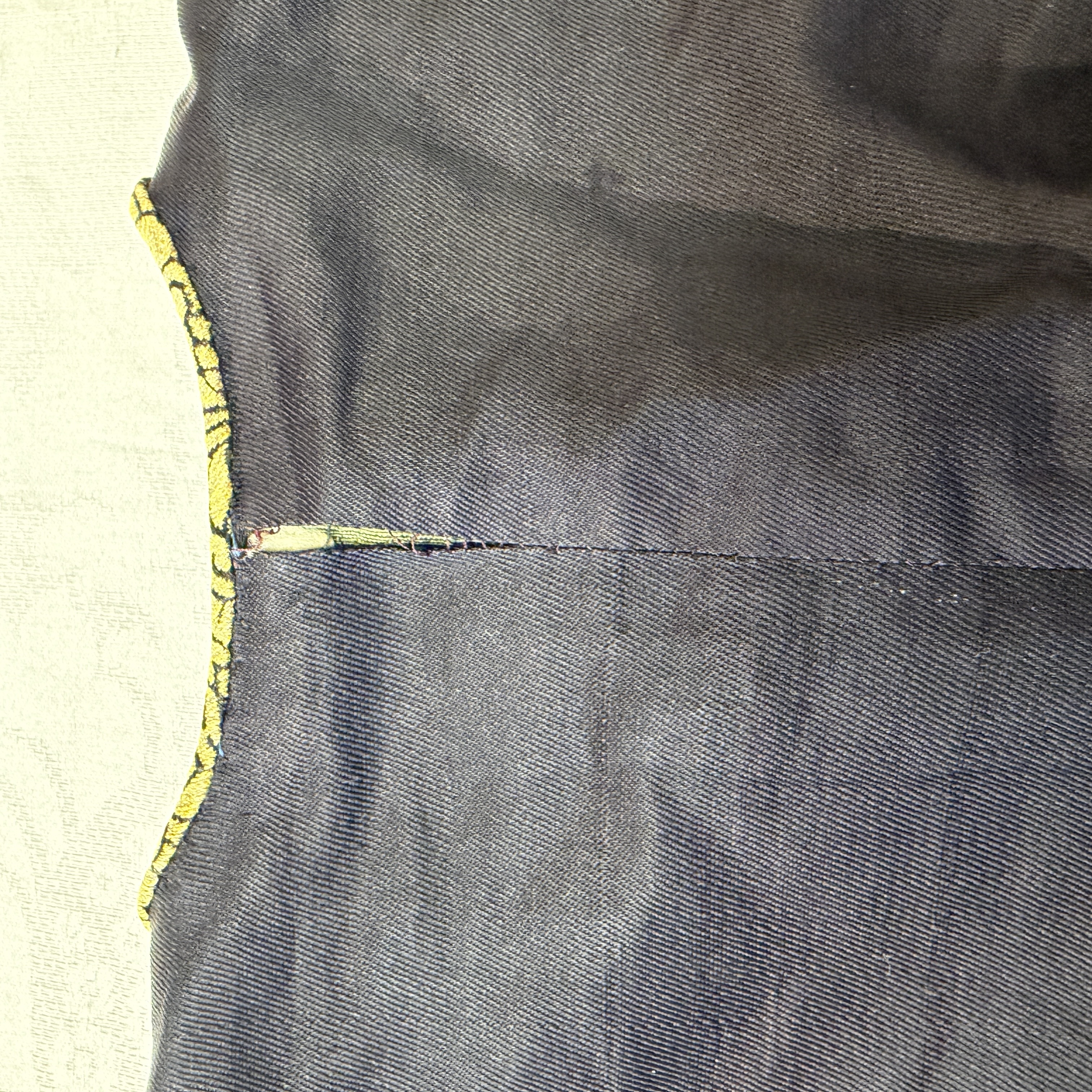 A Chinese embroidered silk dark-blue-ground robe with floral medallions — photo 30