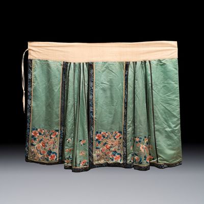 A Chinese embroidered silk green-ground skirt, 19th C.