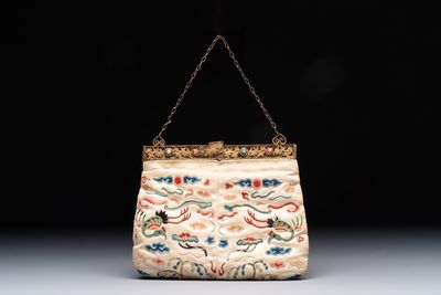 A Chinese embroidered silk purse with red coral- and turquoise-inlaid gilt-bronze mounts, Qing