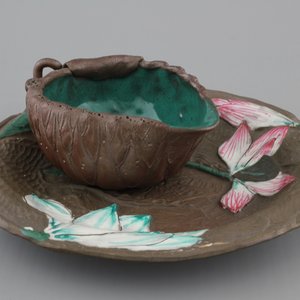 A Chinese enameled yixing stoneware cup and saucer, 19/20th C. — photo 1