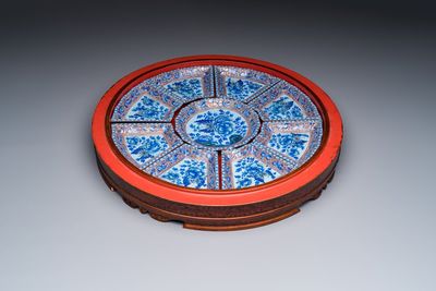 A Chinese enamelled Yixing stoneware nine-piece 'peonies' sweetmeat set on a Southeast Asian lacquer tray, 19th C.