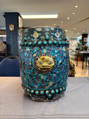 A Chinese Fahua barrel-shaped 'lotus scroll' stool with incised design, Ming — photo 1
