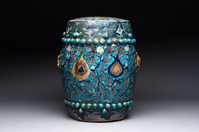 A Chinese Fahua barrel-shaped 'lotus scroll' stool with incised design, Ming