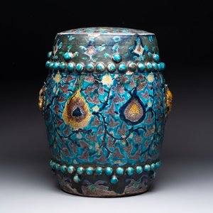 A Chinese Fahua barrel-shaped 'lotus scroll' stool with incised design, Ming — photo 1