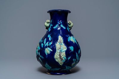 A Chinese fahua relief-decorated vase, 19th C.