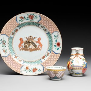 A Chinese famille rose armorial plate, a cup and a 'European subject' milk jug, Yongzheng/Qianlong — photo 1