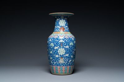 A Chinese famille rose blue-ground 'bajixiang' vase, 19th C.