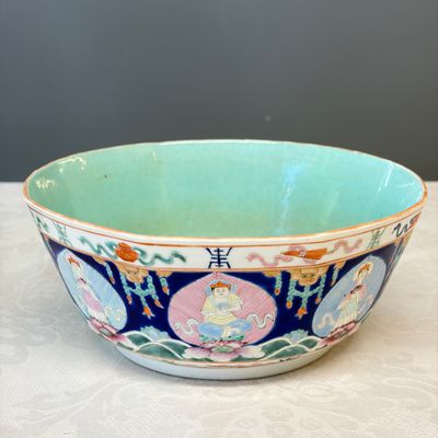 A Chinese famille rose blue-ground 'Baragon Tumed' octagonal bowl — photo 1