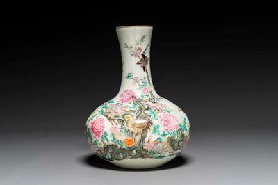 A Chinese famille rose bottle vase with birds among blossoming branches, Qianlong mark, Republic