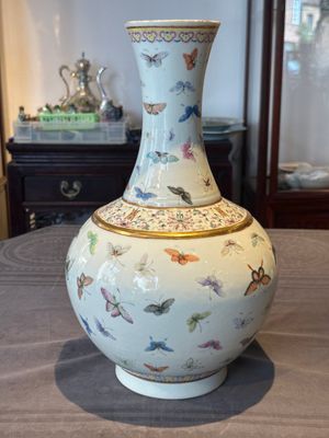 A Chinese famille rose 'butterfly' bottle vase, Guangxu mark and of the period — photo 2
