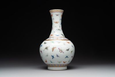 A Chinese famille rose 'butterfly' bottle vase, Guangxu mark and of the period