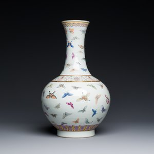 A Chinese famille rose 'butterfly' bottle vase, Guangxu mark and of the period — 照片 1