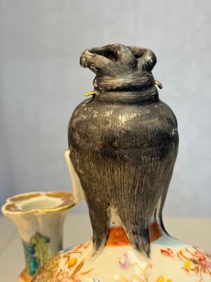 A Chinese famille rose candle holder in the shape of a court lady holding a 'Gu' vase, Qianlong — photo 16