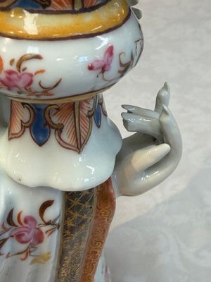 A Chinese famille rose candle holder in the shape of a court lady holding a 'Gu' vase, Qianlong — photo 18