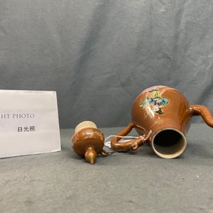 A Chinese famille rose capucin brown-ground ewer and cover, Yongzheng — photo 13