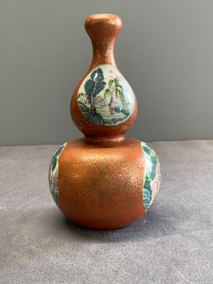 A Chinese famille rose coral-red-ground 'landscape' gourd vase, Qianlong mark, Republic — photo 1