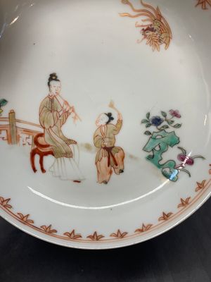 A Chinese famille rose cup and saucer with a lady playing flute, a boy and a phoenix, Qianlong — photo 4