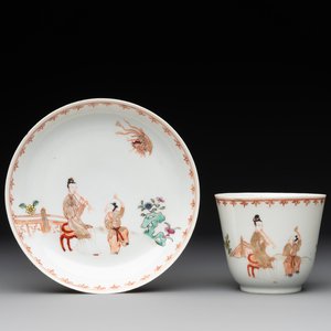 A Chinese famille rose cup and saucer with a lady playing flute, a boy and a phoenix, Qianlong — photo 1