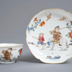 A Chinese famille rose cup and saucer with a warrior riding an elephant, Yongzheng — photo 1