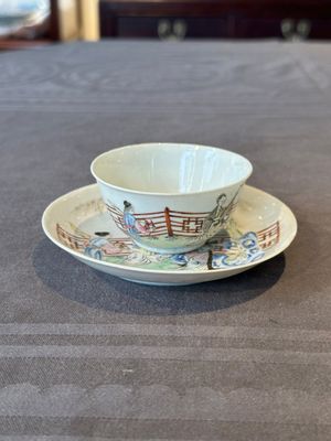 A Chinese famille rose cup and saucer with music making ladies, Yongzheng/Qianlong — photo 1