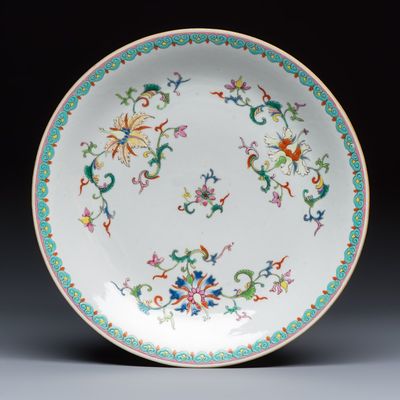 A Chinese famille rose dish with a floral design, Qianlong mark and of the period