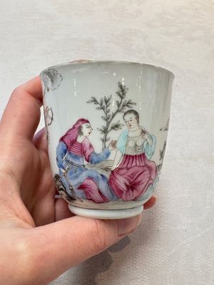 A Chinese famille rose 'erotic subject' cup and saucer, Yongzheng/Qianlong — photo 1