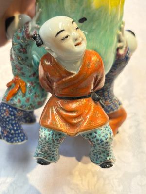 A Chinese famille rose figure of three boys holding a Buddha’s hand, Republic — photo 11