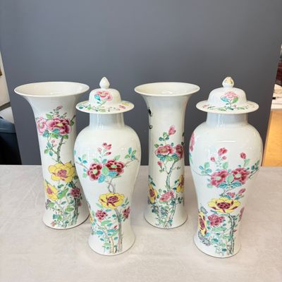 A Chinese famille rose four-piece garniture with floral design — photo 1