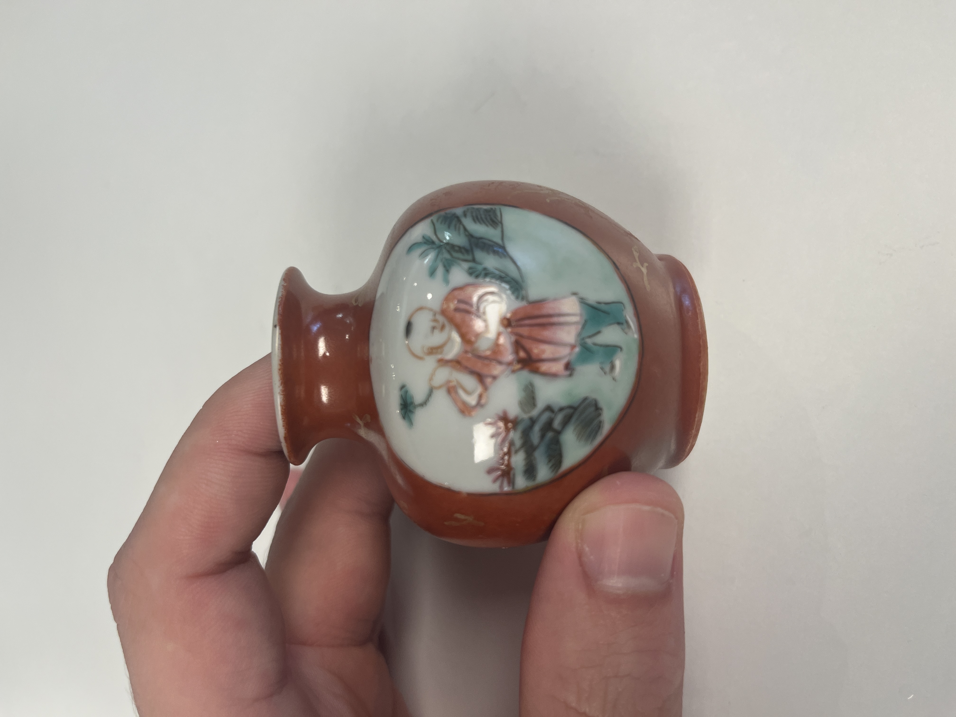A Chinese famille rose gilt coral-red-ground 'Playing Boys' jarlet — photo 1