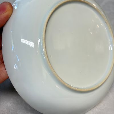 A Chinese famille rose gilt-decorated cup and saucer with figural design — photo 9
