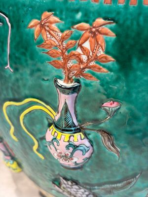 A Chinese famille rose green-ground 'Antiquities' fish bowl or jardinière with applied relief design, 19th C. — photo 6